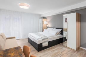 Maxim Apartments